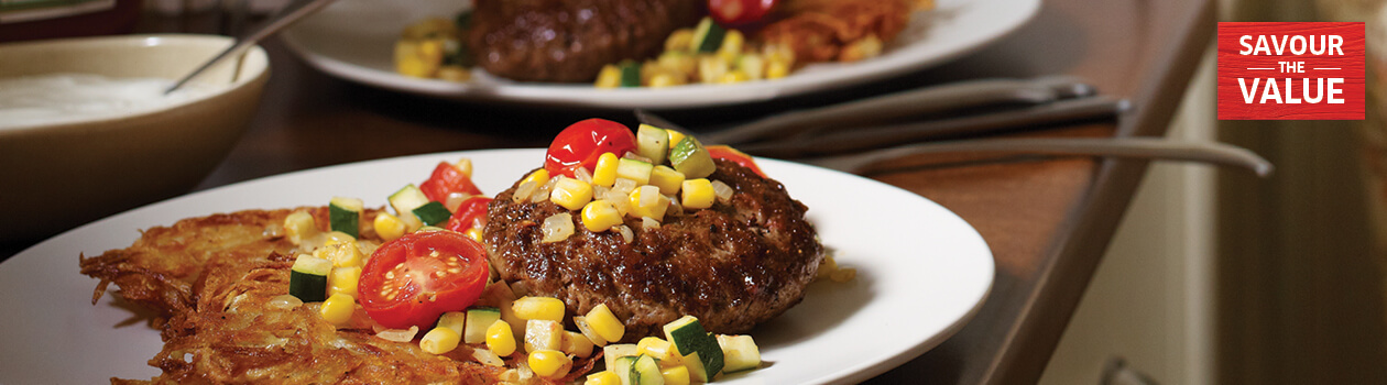 Hamburger steak with winter ratatouille and potato pancakes